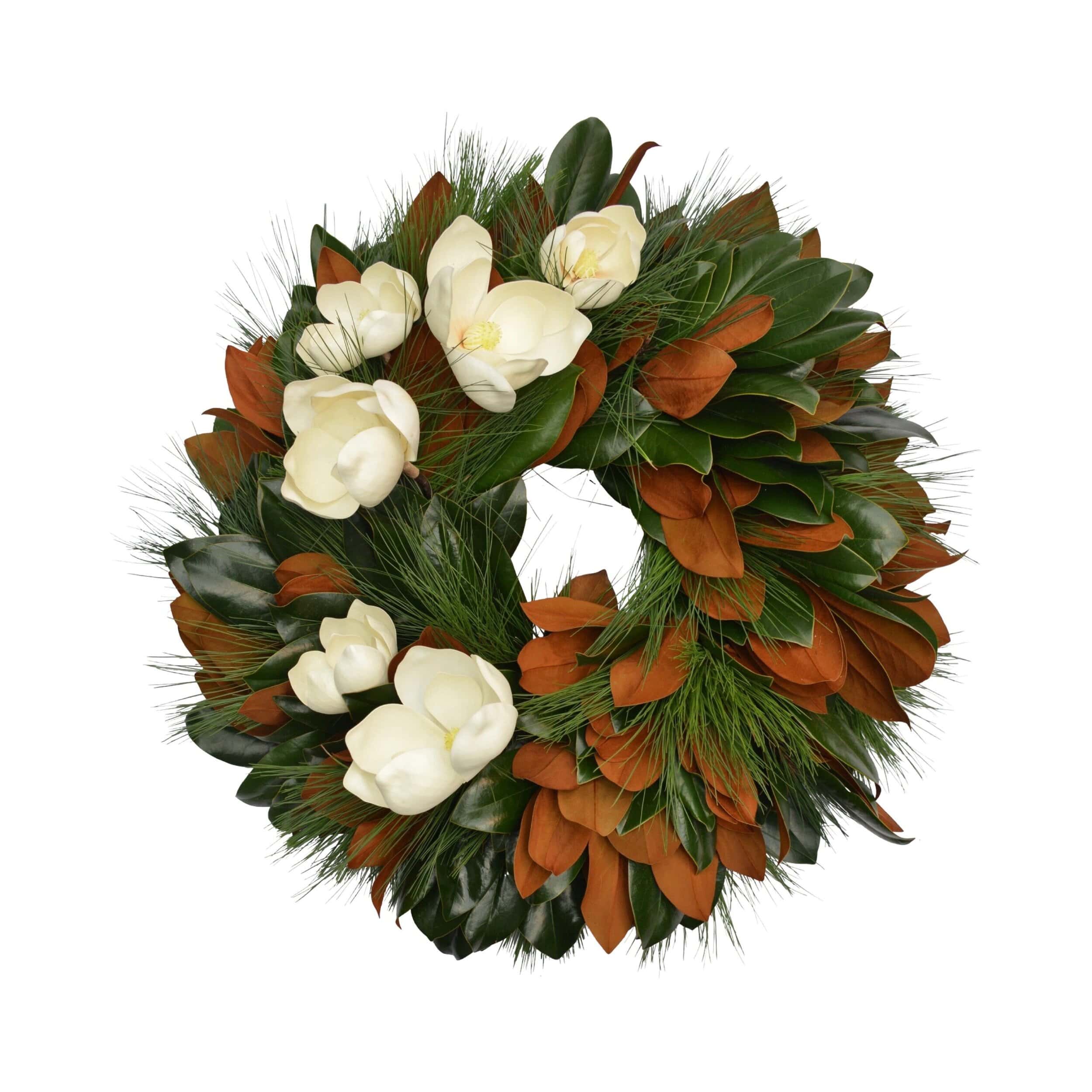 Close-up of fresh magnolia leaves wreath with white flowers from The Dove Collection by Weston Farms.